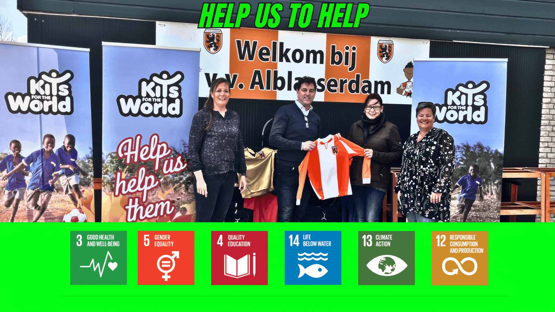 A representative holding a donated football jersey in front of Kits for the World banners